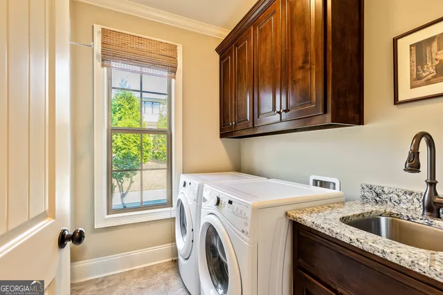 a outdoor living space with furniture and a rug