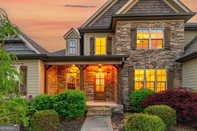 a view of a balcony with chair and table