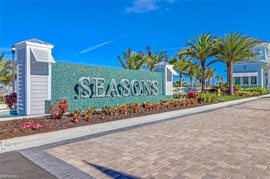 28165 Captiva Shell Loop Bonita Springs, FL 34135 - Photo 2 of 38 a sign on the side of a building
