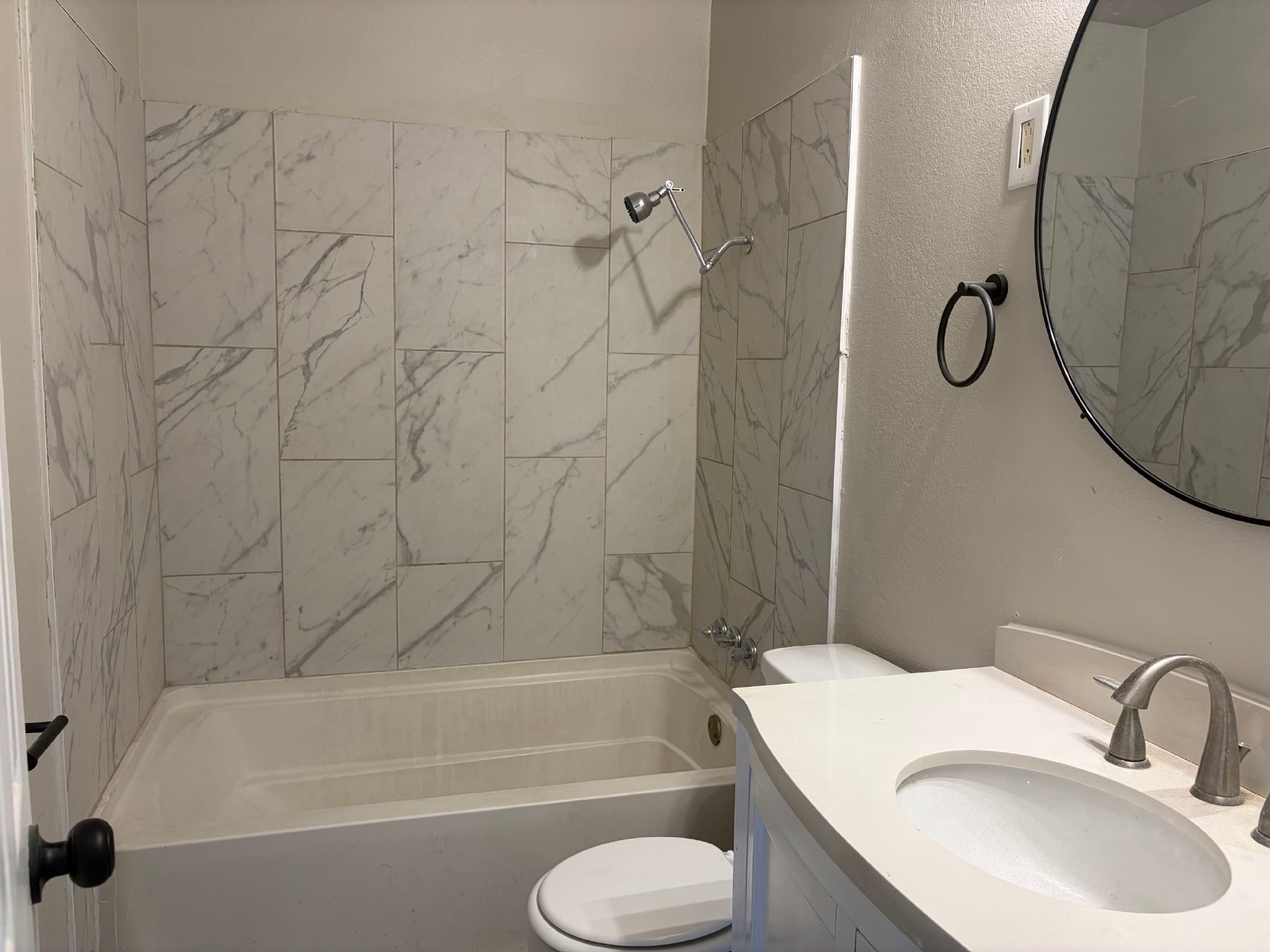 5406 Lyndhurst Drive Houston, TX 77033 - Photo 16 of 17 a bathroom with a toilet sink and shower