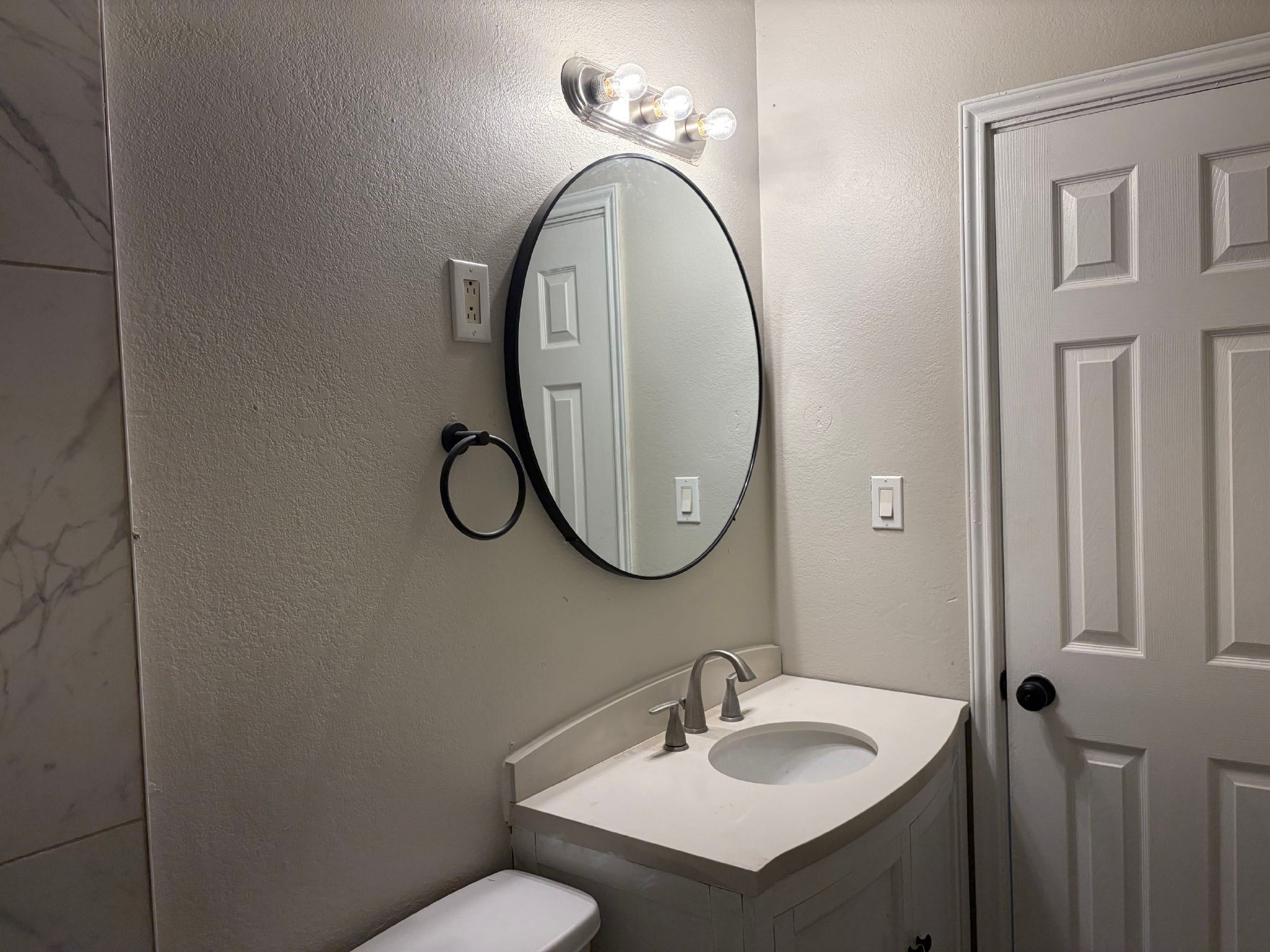 5406 Lyndhurst Drive Houston, TX 77033 - Photo 17 of 17 a bathroom with a sink and a mirror
