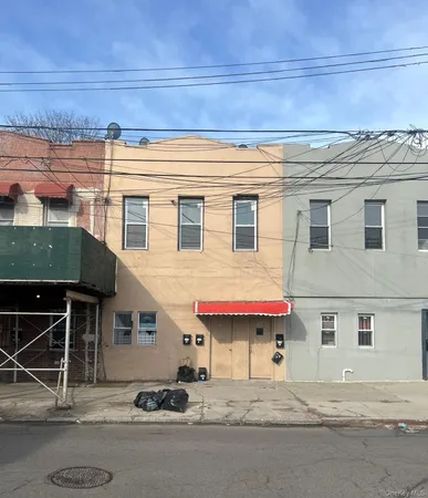 a front view of a house with a garage