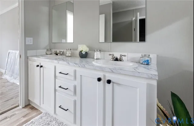 a kitchen with a sink and cabinets
