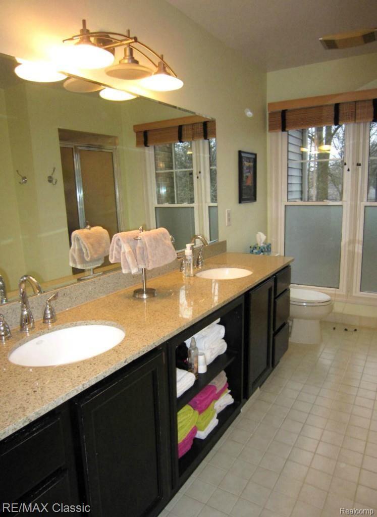 23061 Farmington Road, Unit 22 Farmington, MI 48336 - Photo 12 of 16 Master Bathroom