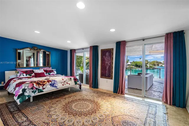 a bathroom with a tub sink and shower