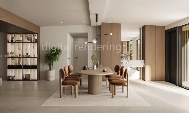 an aerial view of a town with big trees