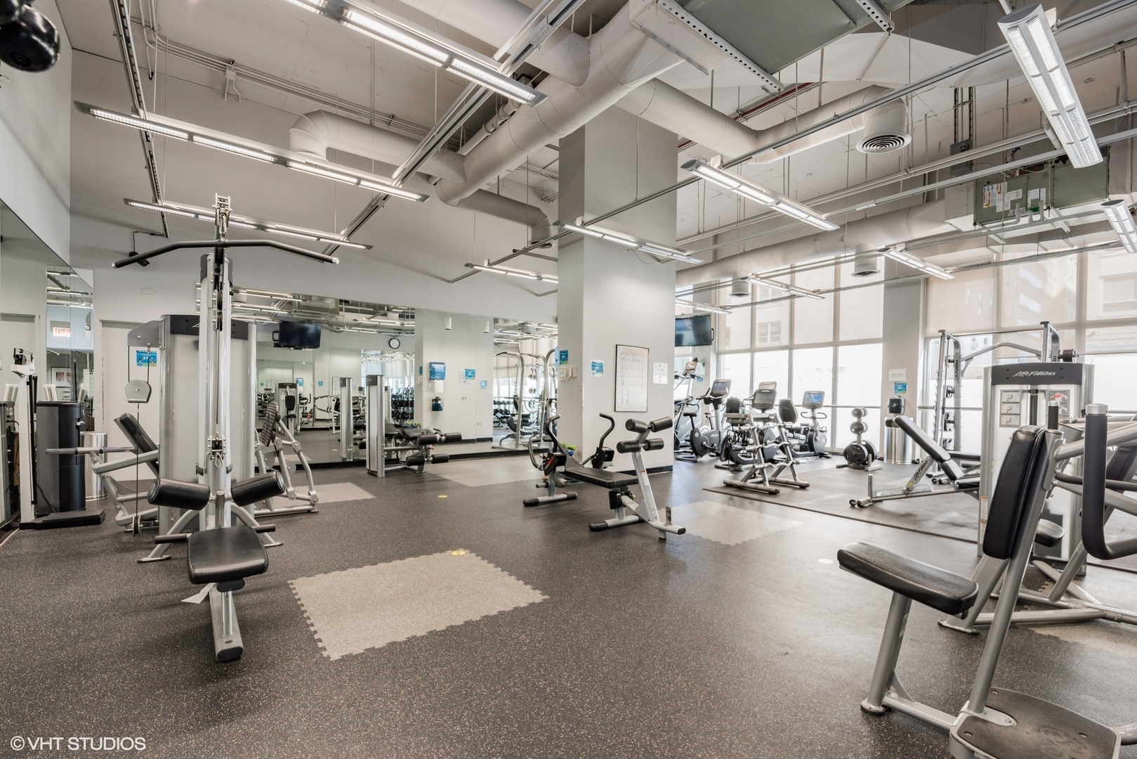 655 West Irving Park Road, Unit 1505 Chicago, IL 60613 - Photo 21 of 23 a view of a room with gym equipment