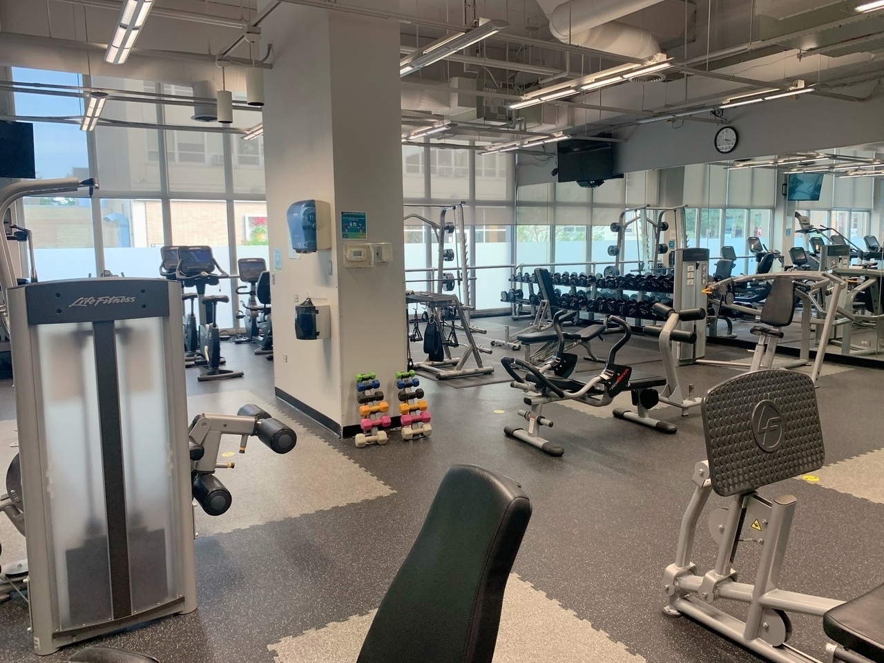 655 West Irving Park Road, Unit 1505 Chicago, IL 60613 - Photo 22 of 23 a room with gym equipment