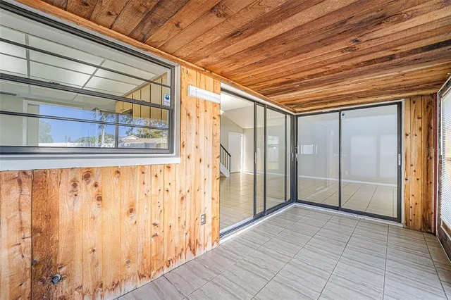 a view of a back yard from a balcony