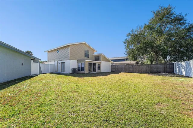 a house view with a swimming pool