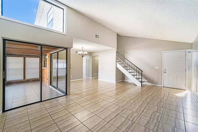 a view of a hallway with staircase