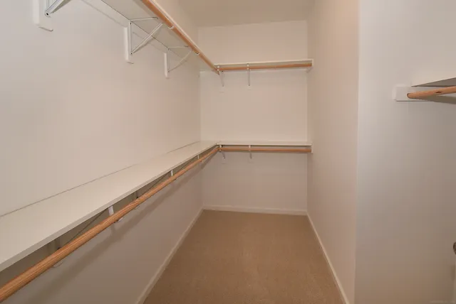 a view of a room with racks on the wall