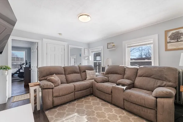 a living room with furniture and a couch