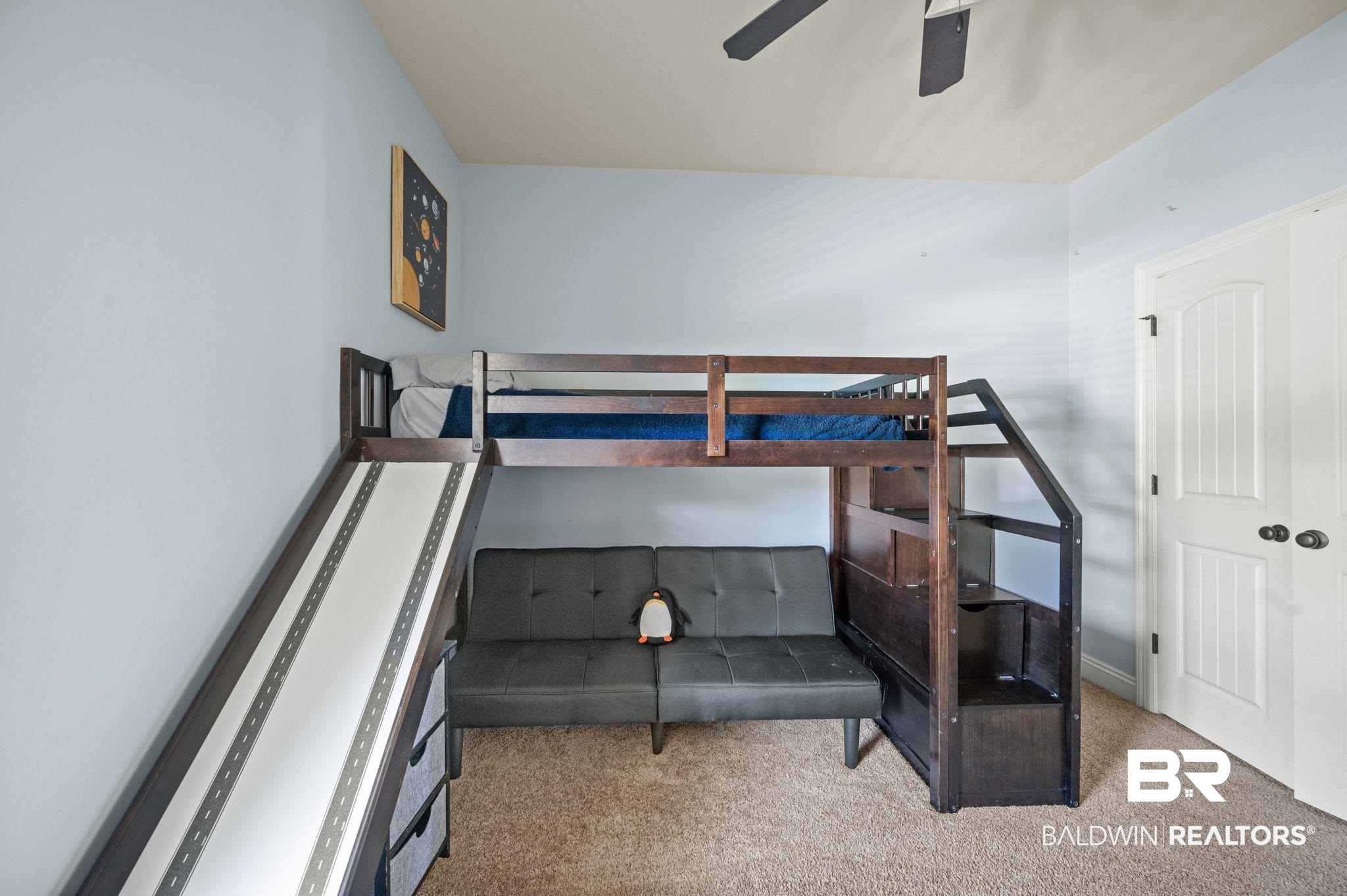3879 Symphony Way West Semmes, AL 36575 - Photo 27 of 34 Bedroom with light colored carpet and ceiling fan