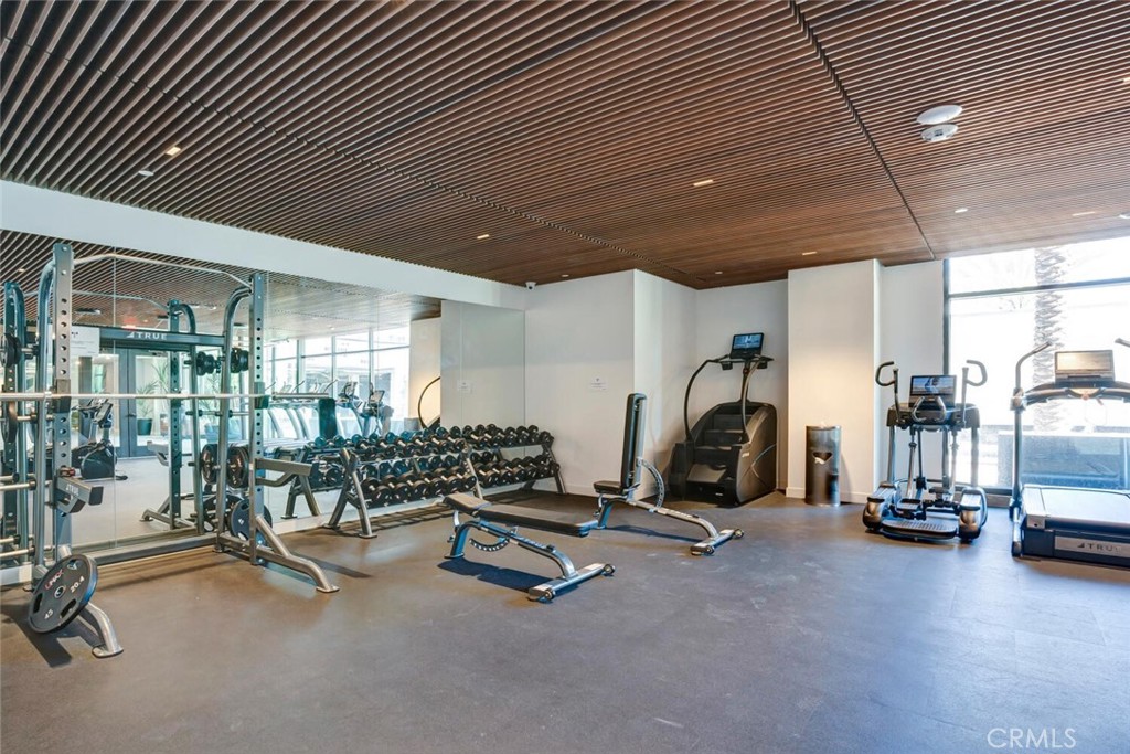 1306 Rivington Irvine, CA 92612 - Photo 37 of 75 a view of a room with gym equipment