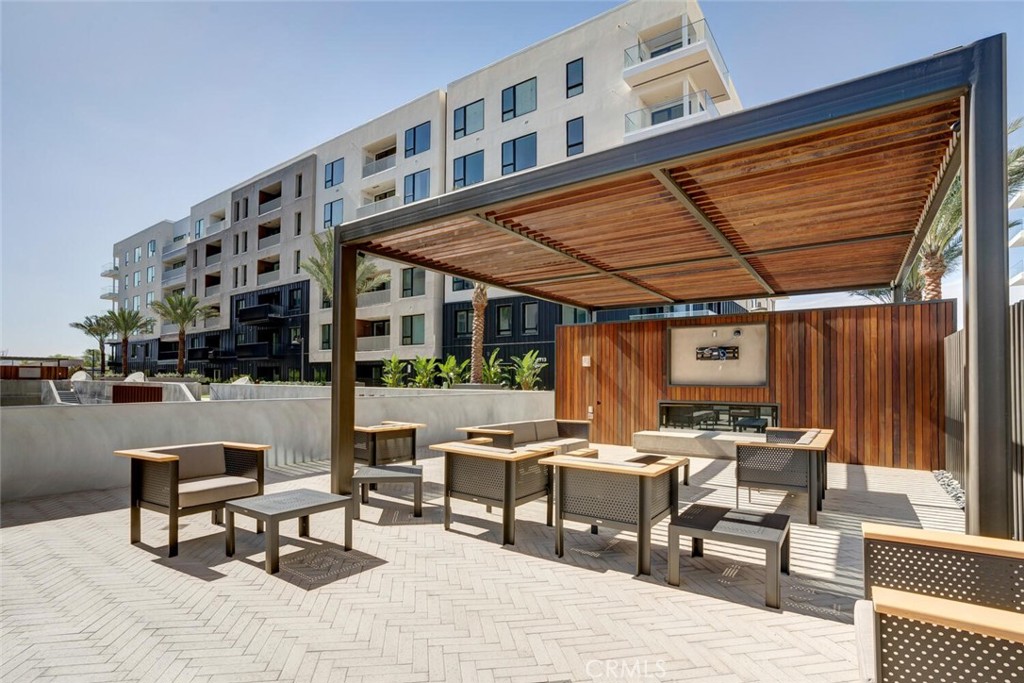 1306 Rivington Irvine, CA 92612 - Photo 39 of 75 a building outdoor space with patio furniture and potted plants