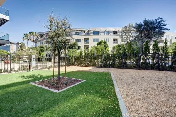a view of swimming pool yard and lake view