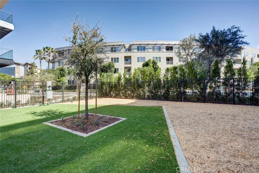 1306 Rivington Irvine, CA 92612 - Photo 43 of 75 a front view of a house with a yard