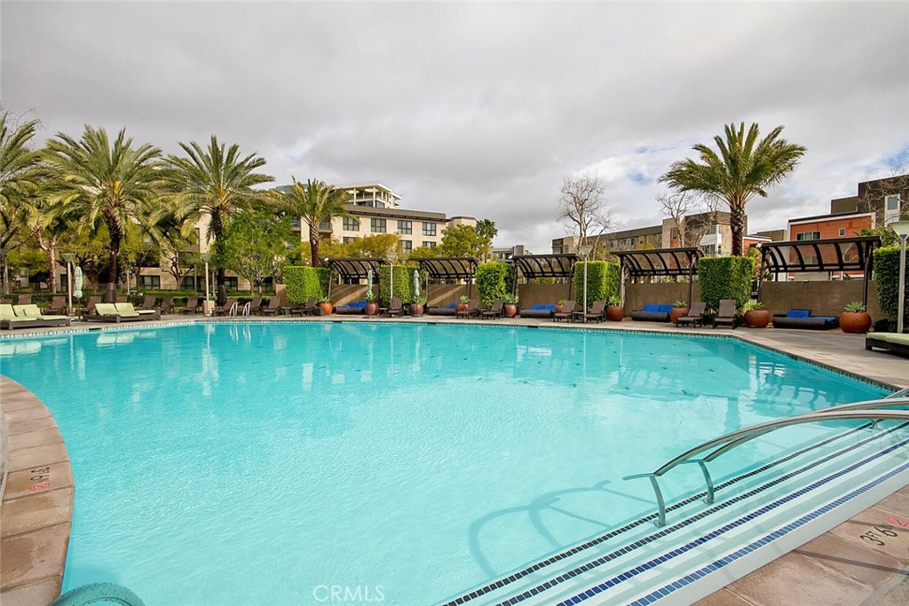 1306 Rivington Irvine, CA 92612 - Photo 65 of 75 a view of swimming pool yard and lake view