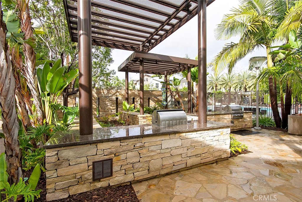 1306 Rivington Irvine, CA 92612 - Photo 67 of 75 a view of swimming pool with outdoor seating