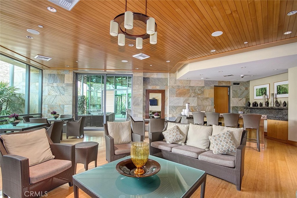 1306 Rivington Irvine, CA 92612 - Photo 70 of 75 a living room with furniture and a large window