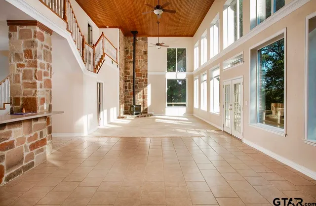 a aerial view of a house with swimming pool and outdoor space