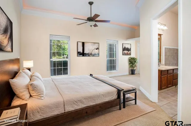 a balcony with a table and chairs