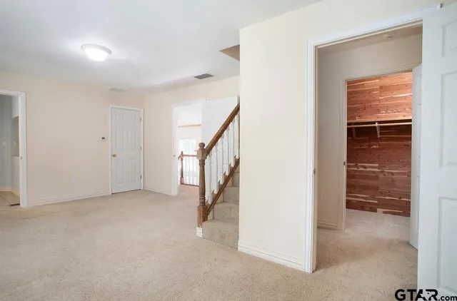 a view of a lake with palm trees