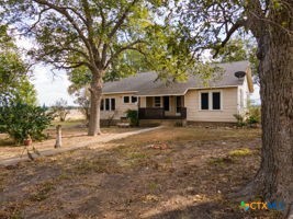 1825 Hruskaville Road Temple, TX 76501 - Photo 1 of 15 a front view of a house with a yard