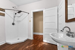 1825 Hruskaville Road Temple, TX 76501 - Photo 9 of 15 a bathroom with a sink and a mirror