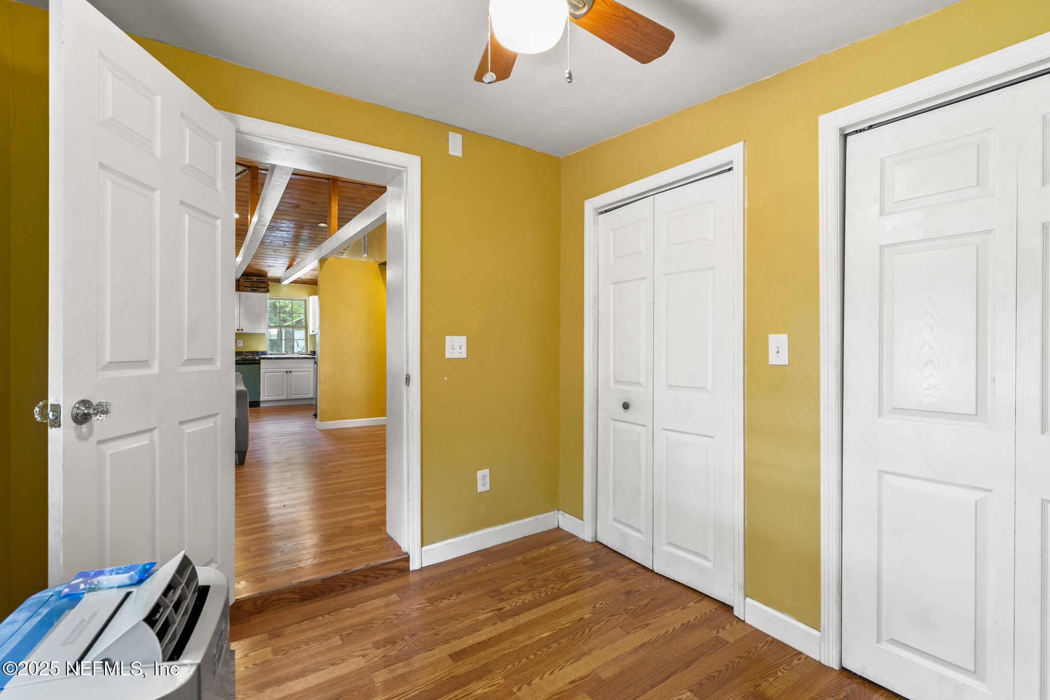 111 Palmer Street St. Augustine, FL 32084 - Photo 24 of 59 a view of livingroom with hardwood floor and a ceiling fan