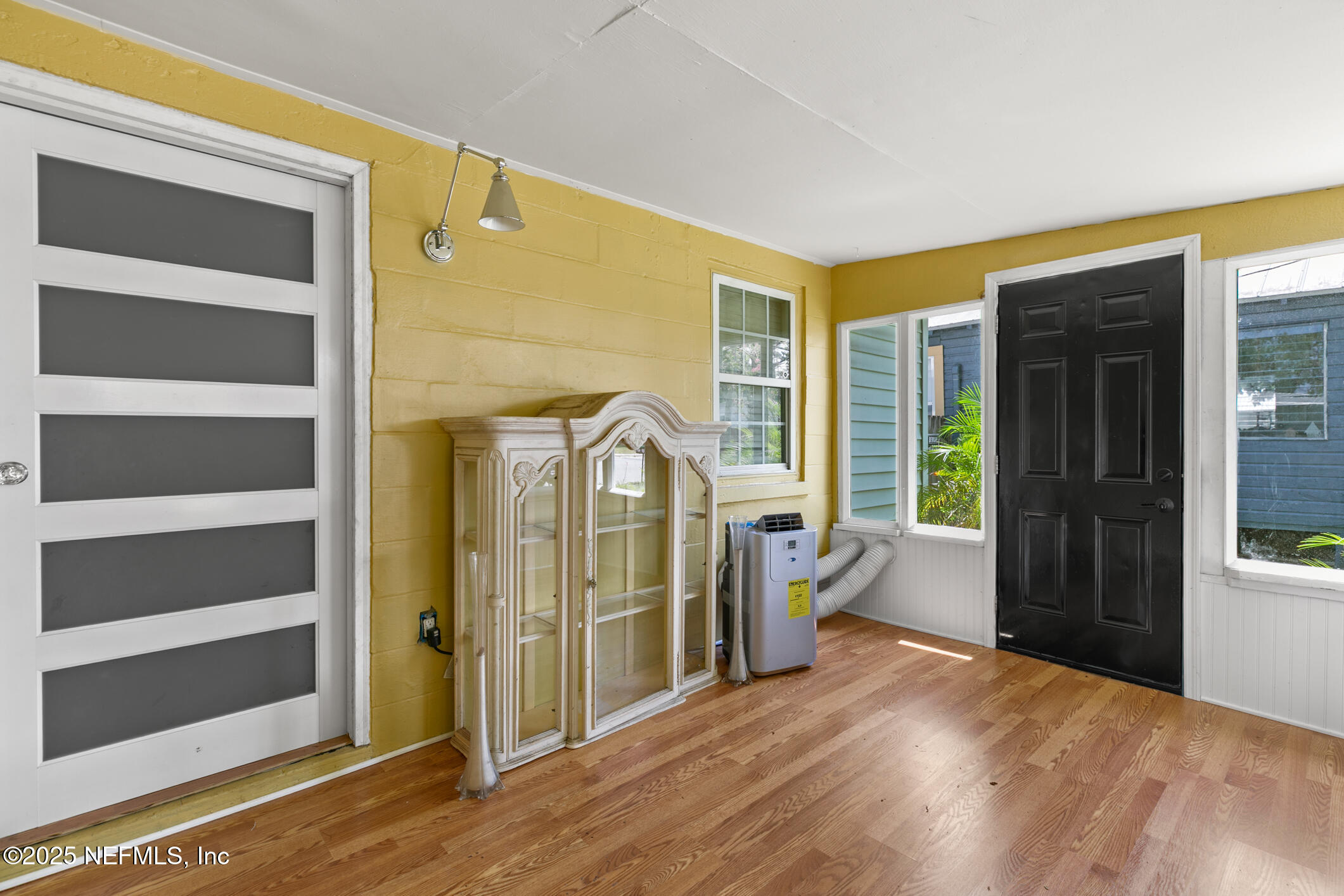 111 Palmer Street St. Augustine, FL 32084 - Photo 10 of 59 a view of entryway with wooden floor and windows