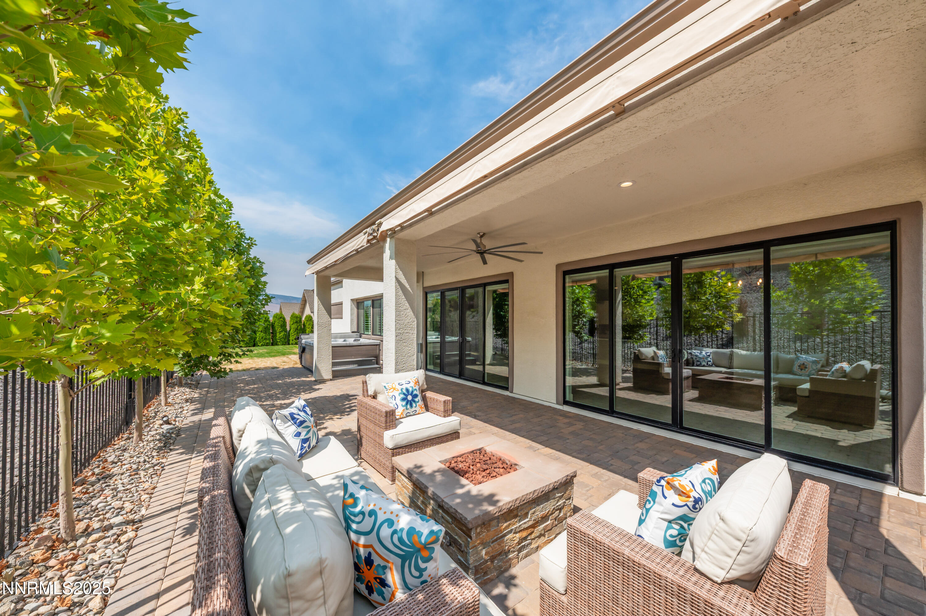 3034 Copper Stone Drive Reno, NV 89521 - Photo 18 of 24 a view of a patio with furniture and floor to ceiling window