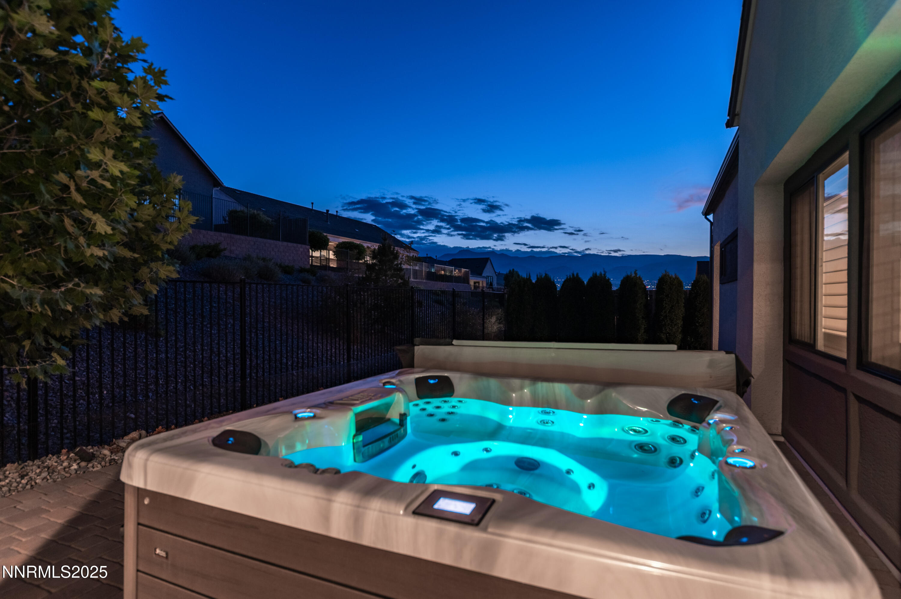3034 Copper Stone Drive Reno, NV 89521 - Photo 19 of 24 a view of a backyard with a tub