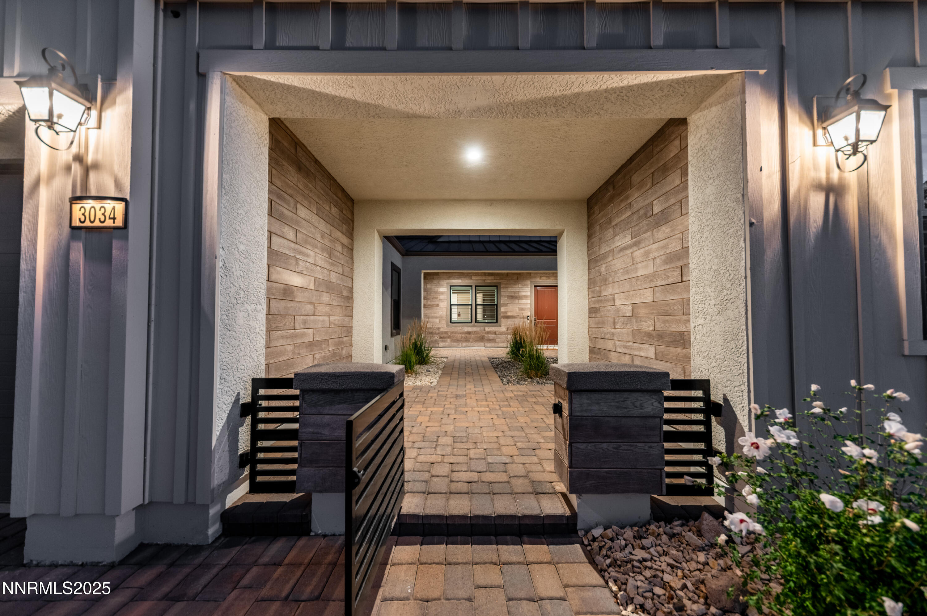 3034 Copper Stone Drive Reno, NV 89521 - Photo 3 of 24 a front view of a house with stairs