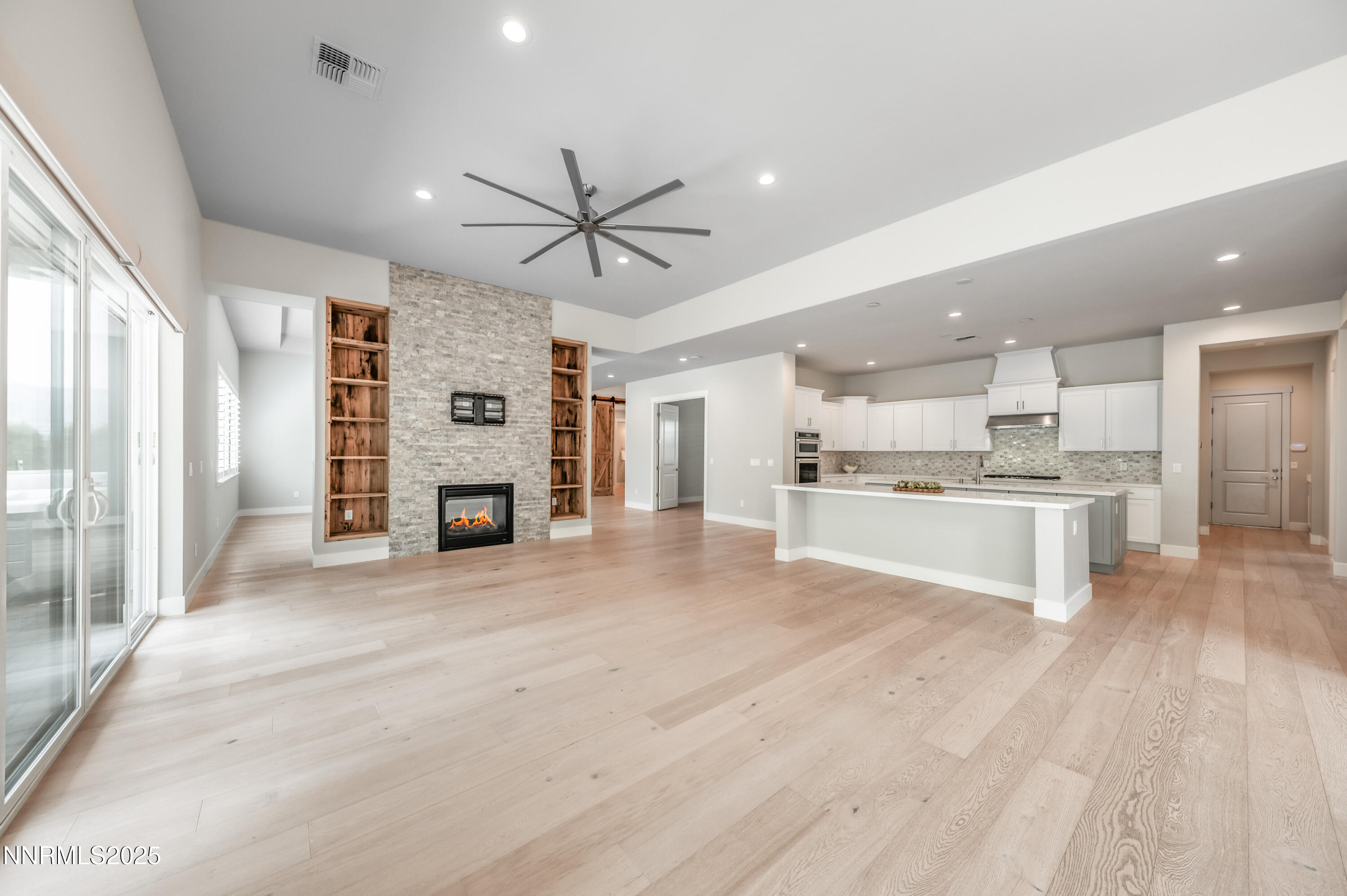 3034 Copper Stone Drive Reno, NV 89521 - Photo 10 of 24 a view of kitchen with cabinets and wooden floor
