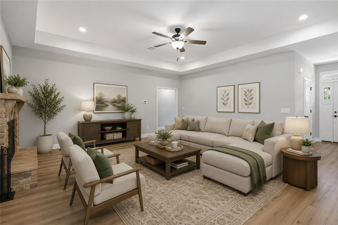 912 Watercrest Road West Union, SC 29696 - Photo 8 of 49 VIRTUALLY STAGED: This inviting living room features a fireplace and offers abundant space for relaxation.