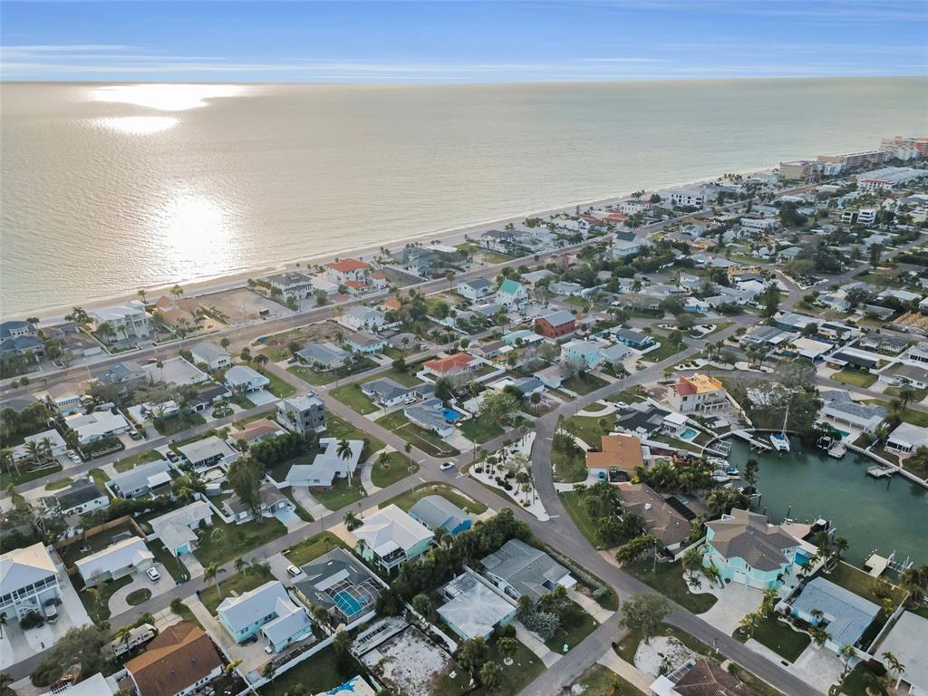 15812 3rd Street East Redington Beach, FL 33708 - Photo 16 of 19 an aerial view of a city with ocean view in back