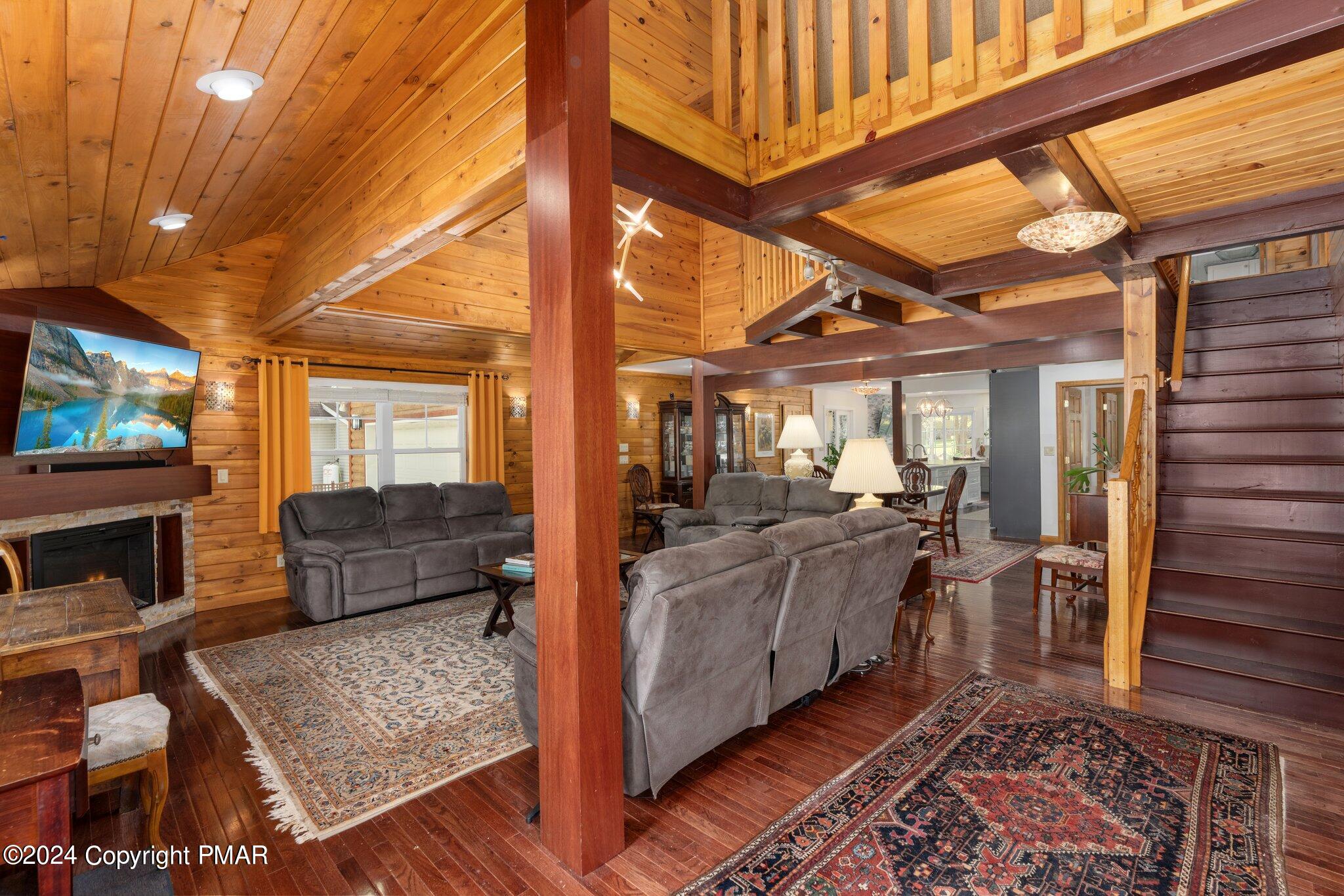 271 4 Seasons Drive Drums, PA 18222 - Photo 18 of 74 a living room with furniture and a flat screen tv
