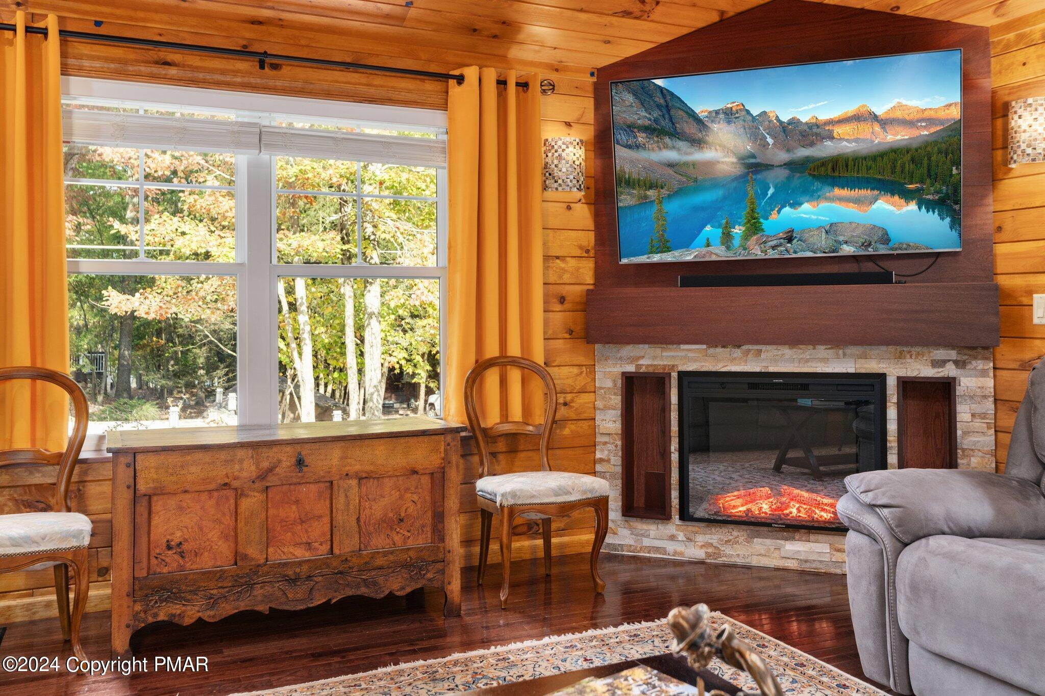 271 4 Seasons Drive Drums, PA 18222 - Photo 21 of 74 a living room with furniture and a fireplace