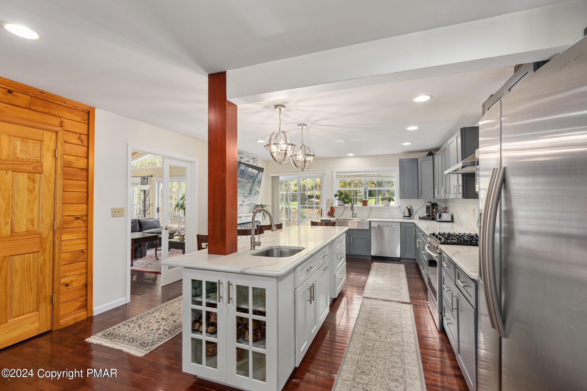271 4 Seasons Drive Drums, PA 18222 - Photo 27 of 74 a large white kitchen with a large window and stainless steel appliances