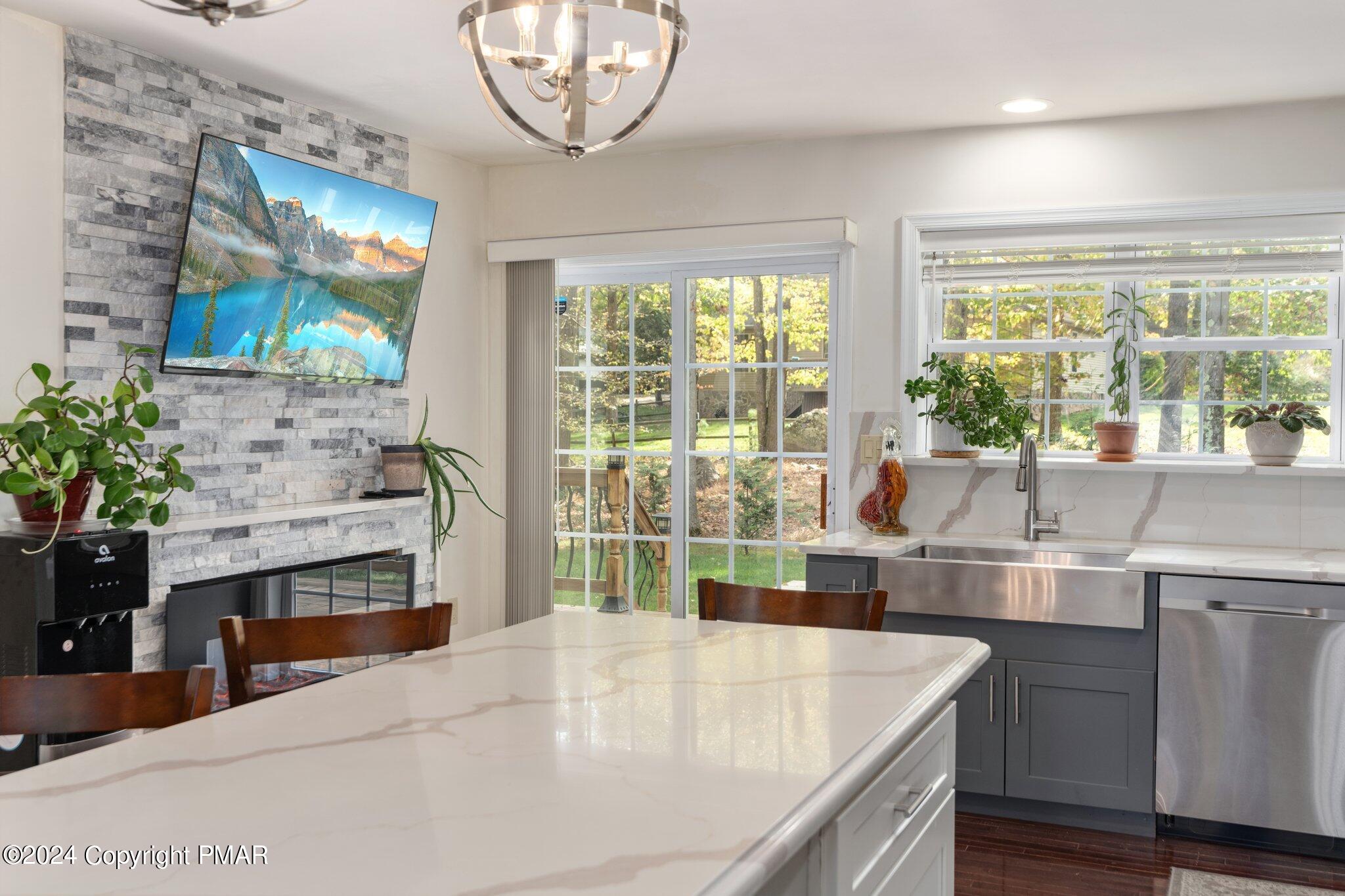 271 4 Seasons Drive Drums, PA 18222 - Photo 28 of 74 a kitchen with a stove and a large window