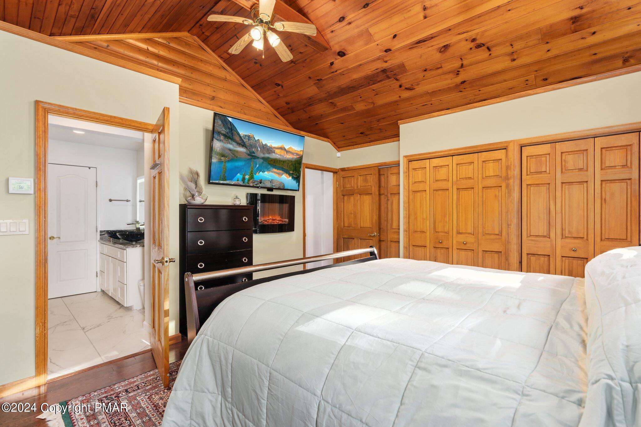 271 4 Seasons Drive Drums, PA 18222 - Photo 45 of 74 a bedroom with a bed and a large window