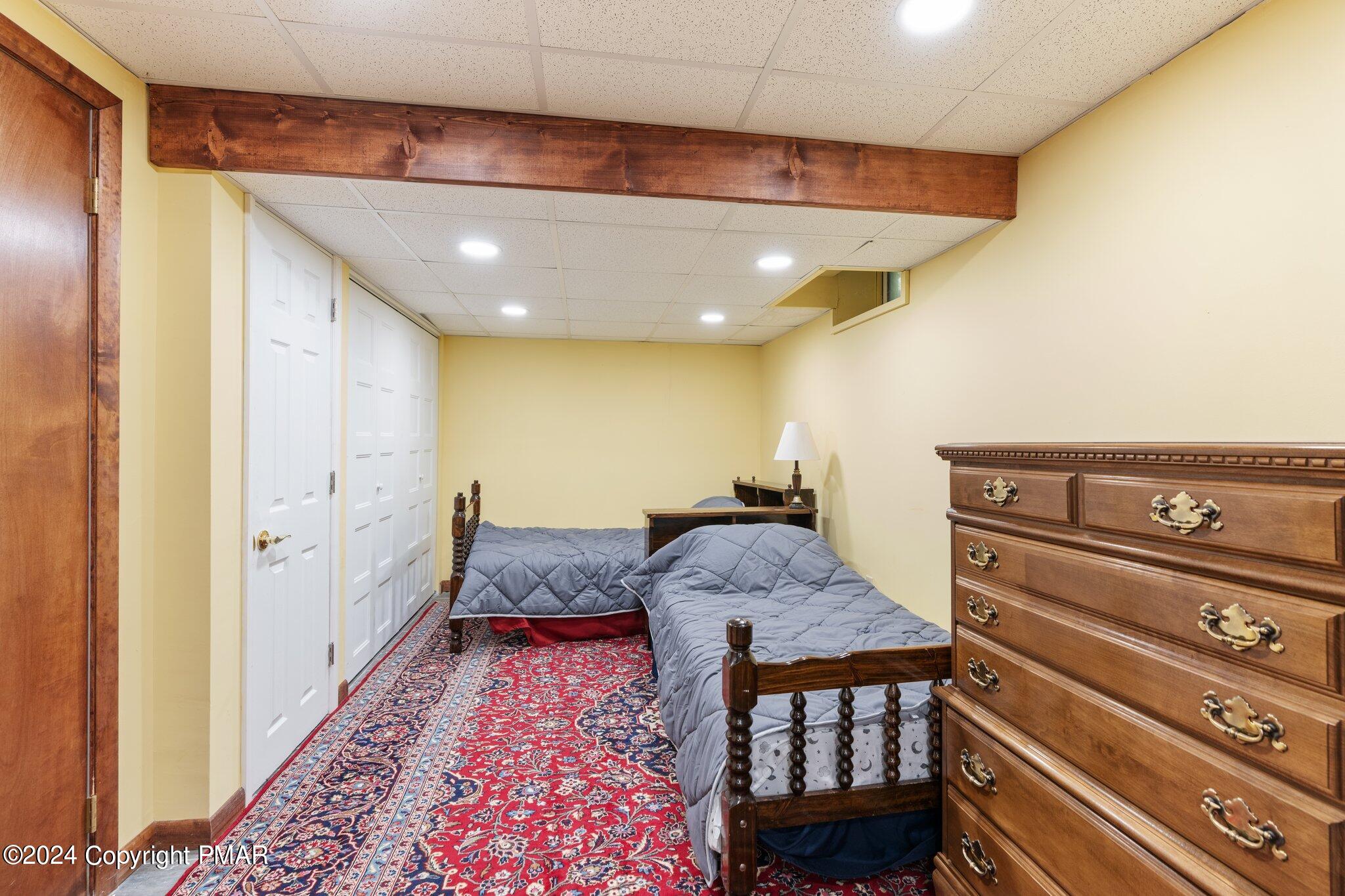 271 4 Seasons Drive Drums, PA 18222 - Photo 63 of 74 a spacious bathroom with a granite countertop sink and a mirror