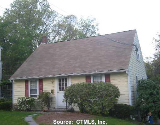 30 Thrushwood Place Waterbury, CT 06708 - Photo 1 of 1 a front view of a house with a yard