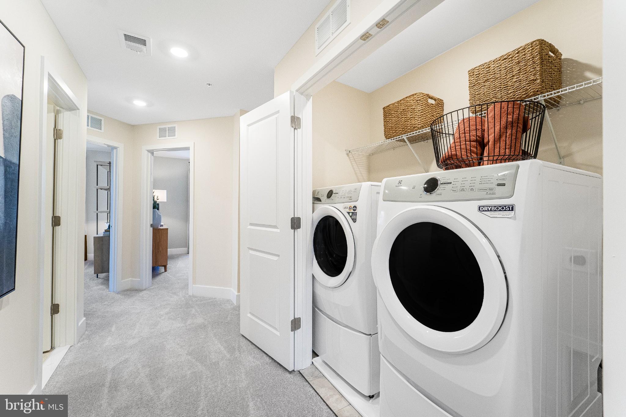 1759 Water Xing Road Baltimore, MD 21208 - Photo 14 of 21 a view of a storage & utility room with washer and dryer