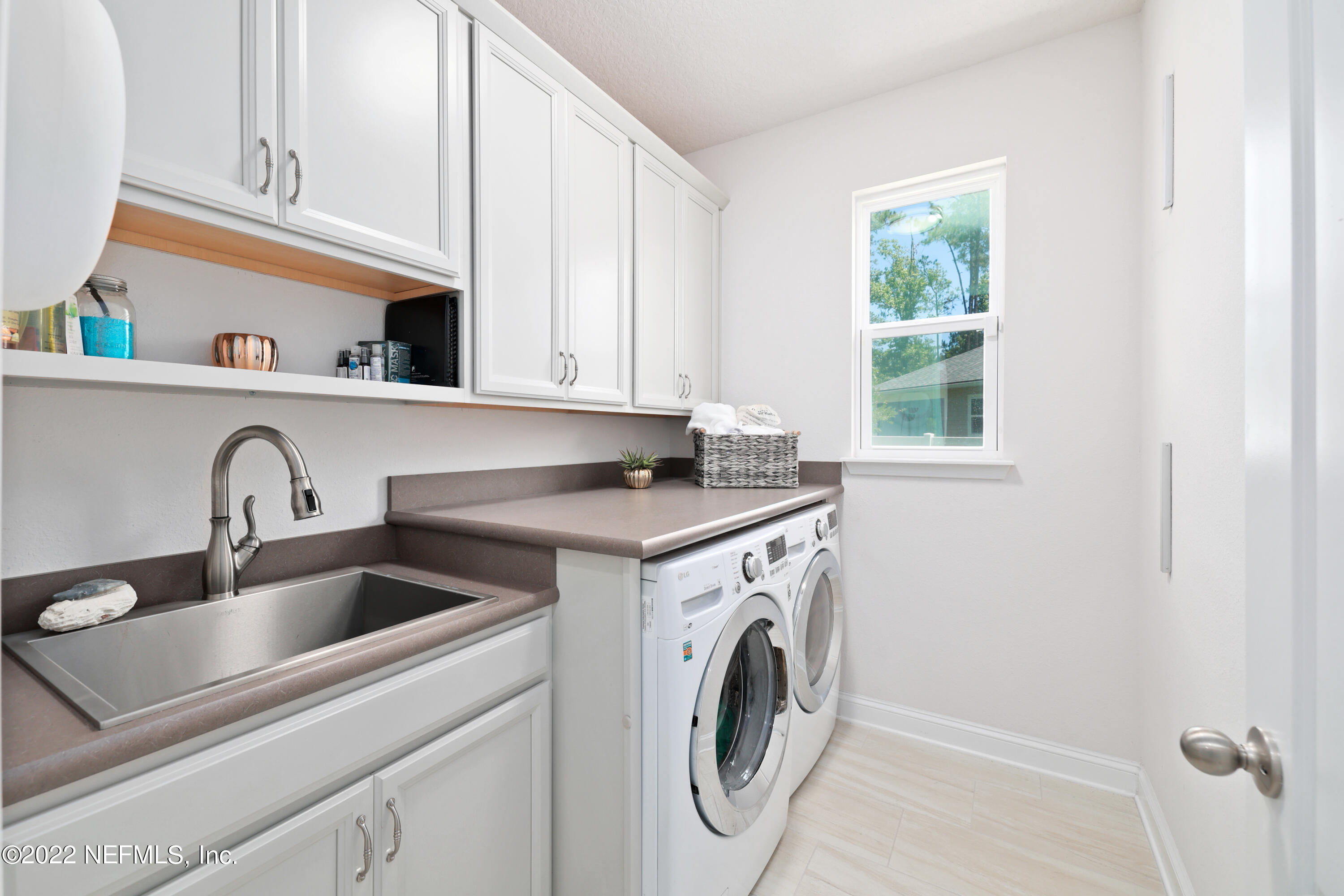 275 Downs Corner Road St. Augustine, FL 32092 - Photo 21 of 42 Laundry Room w Cabinetry!