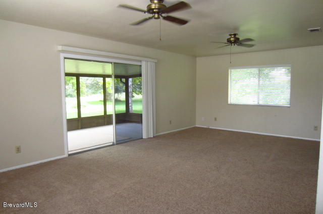 1180 Riviera Drive Northeast Palm Bay, FL 32905 - Photo 8 of 19 2nd living area