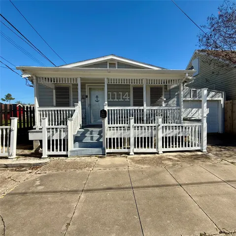 a front view of a house with a porch