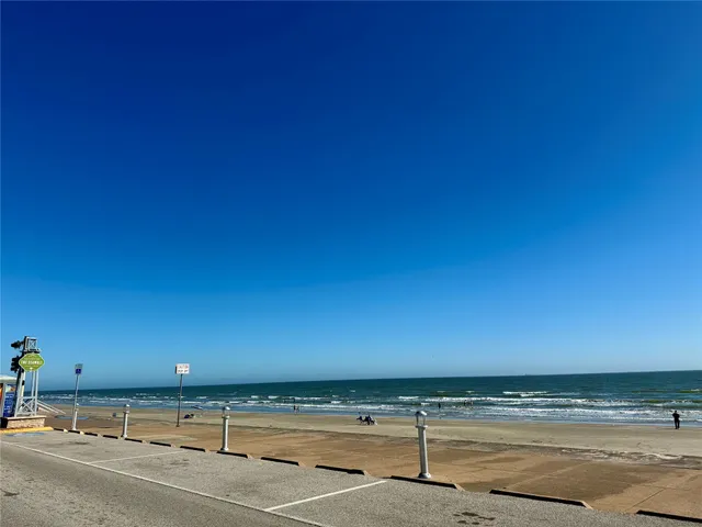 a view of an outdoor space with wooden floor